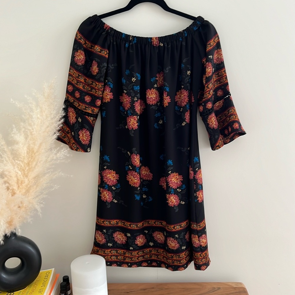 Press summer dress can be worn off shoulder too.